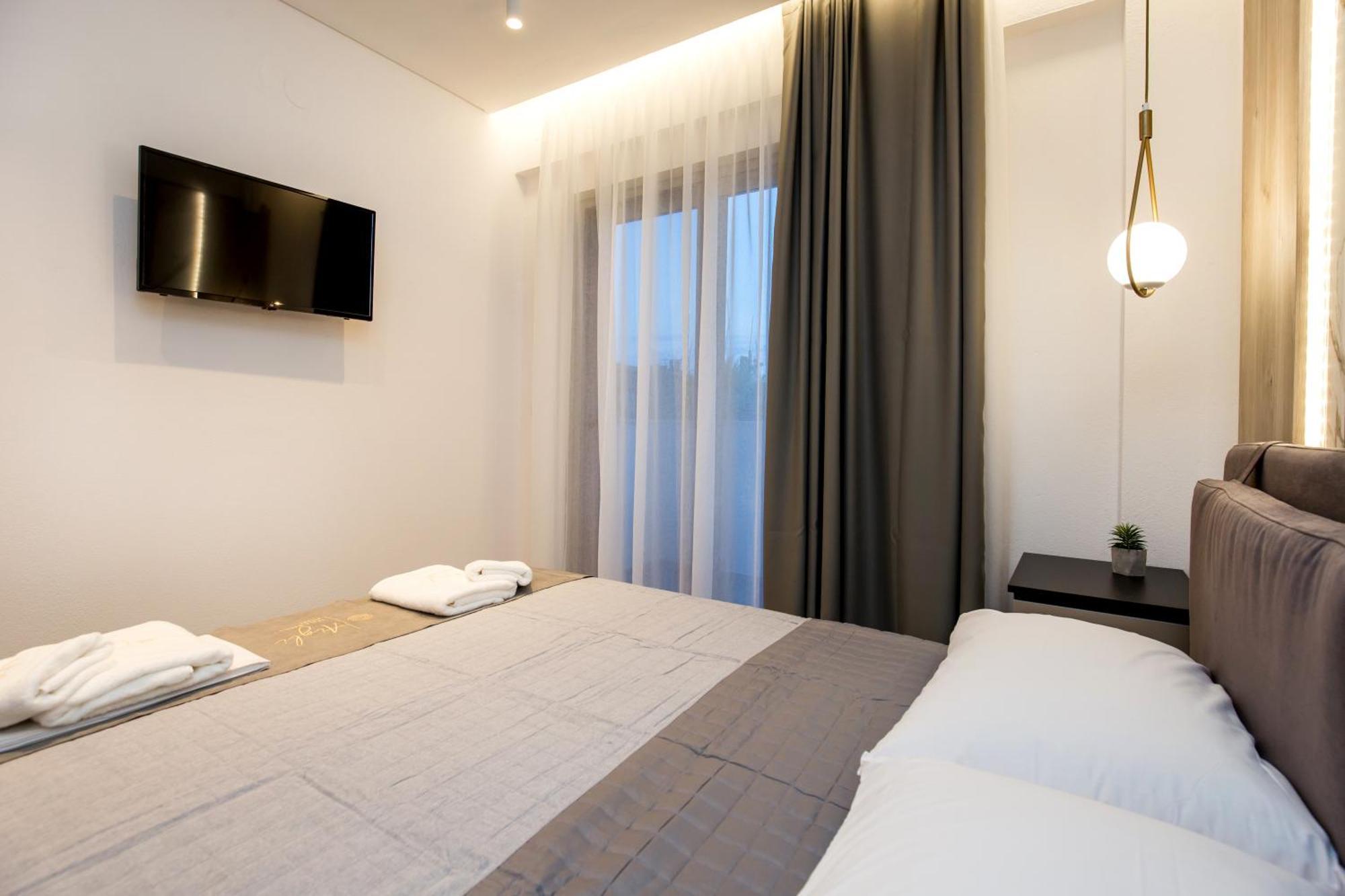 Aigli Skala Maries Deluxe Apartment สกาลา มาริออน ภายนอก รูปภาพ