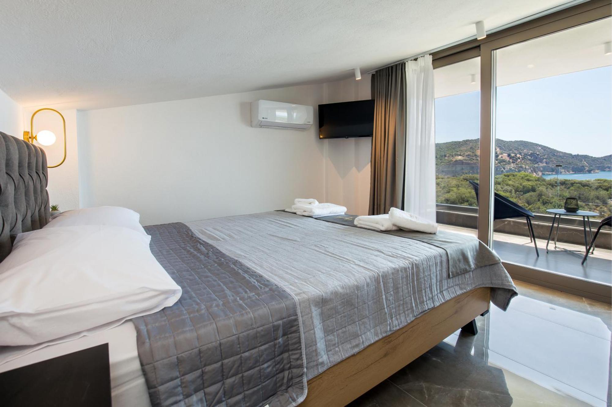 Aigli Skala Maries Deluxe Apartment สกาลา มาริออน ภายนอก รูปภาพ